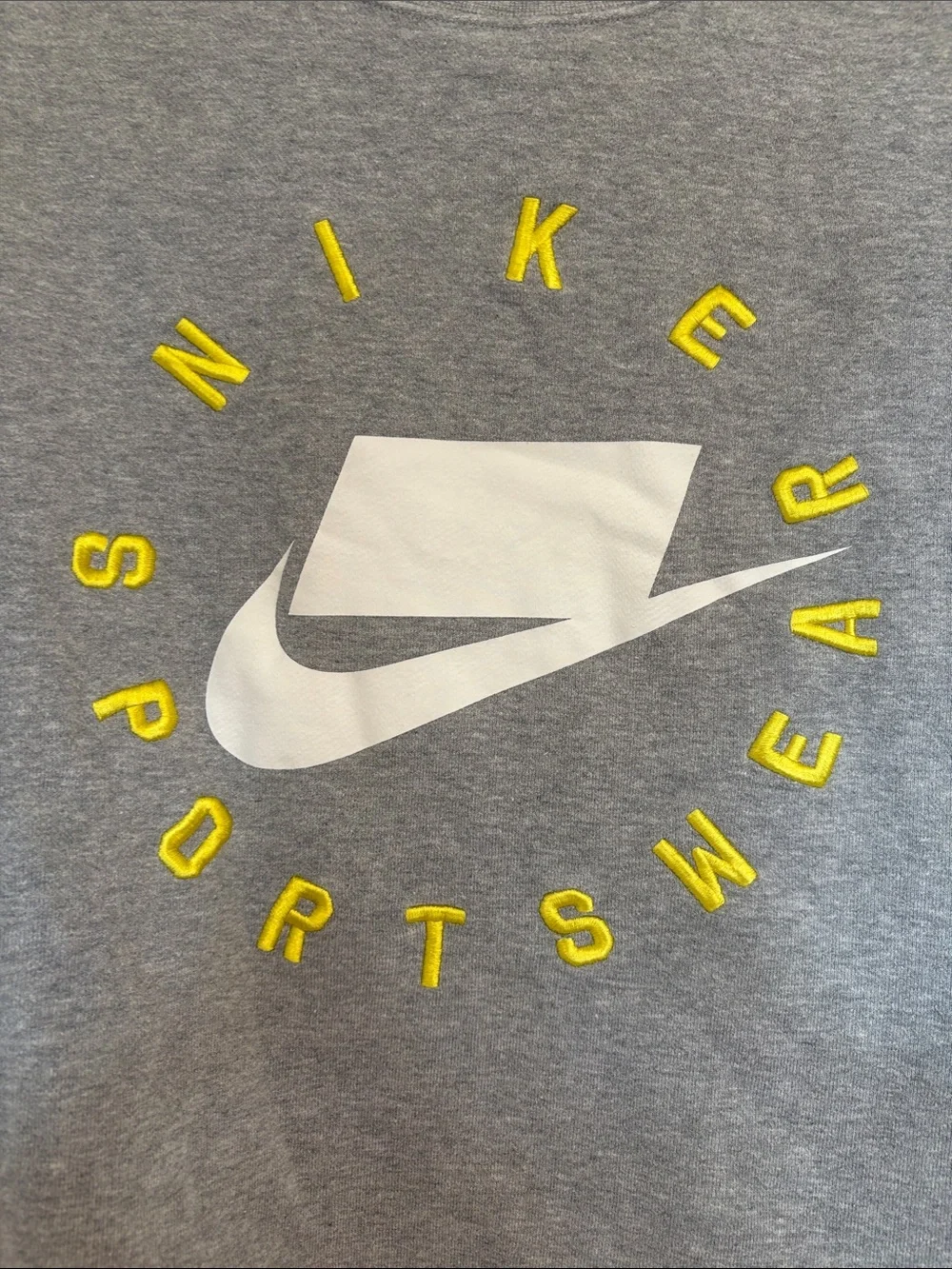 Nike Gray Crewneck Sweatshirt with White Swoosh and Yellow 'Sportswear' Text